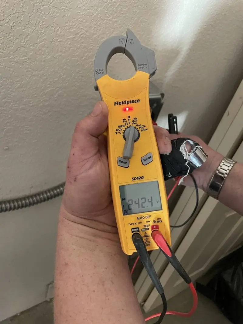 Voltage testing with clamp meter during Hot Tub / Pool Electrical Wiring in Millstone